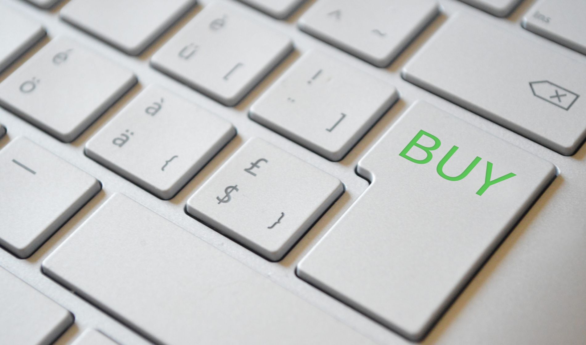 clavier d'ordinateur, touche entrée avec la mention buy